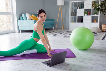 Poster - Photo of adorable sexy girl dressed sportive suit watching internet yoga lesson modern device indoors house home