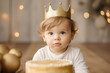 Portrait of an adorable little boy wearing a prince crown celebrating his first birthday, luxury, cake and pastel studio decor. Generative AI.