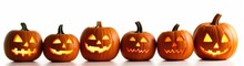 Halloween Jack O Lantern Pumpkins In A Row On White Background. Generative AI