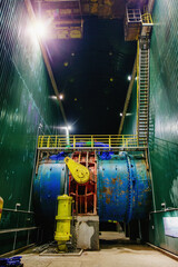 Wall Mural - Large pipe with water regulation system in hydroelectric power plant