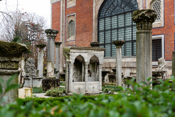 Architectural elements, parts of columns, bas-reliefs and sculptures displayed outdoors near Istanbul Archeological Museum, Turkey