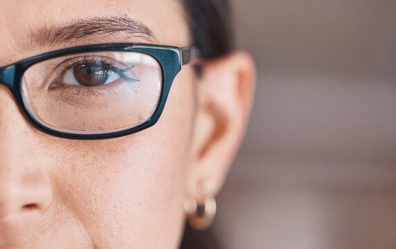 Business woman, face and glasses closeup of a professional with vision and eyes. Workforce, young worker eye and female person in a office with a staff portrait, lens and frame with mockup at job