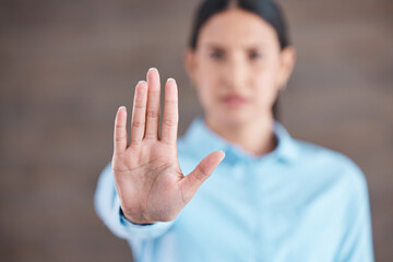 stop, hand sign and woman with no gesture for sexual harassment and violence in workplace. business 