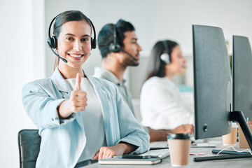 Young woman, thumbs up and call center portrait with smile for agreement, review or yes for customer service. Girl, telemarketing agent and emoji for deal, success and happy at tech support help desk