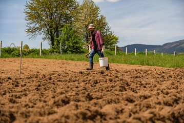 Sticker - Male farmer working on an agricultural fields.