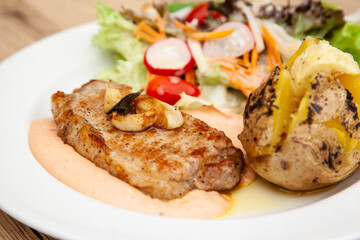 Poster - Pork sirloin steak with baked potato and andalouse sauce