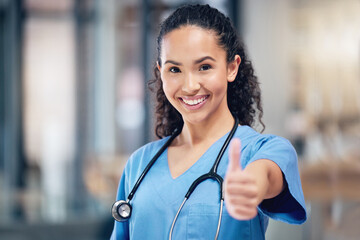 Happy woman, doctor and portrait with thumbs up for healthcare, winning or success at the hospital. Female person or medical professional with thumb emoji, yes sign or like for goals at the clinic