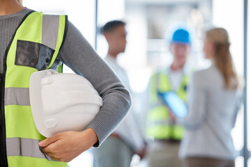 Wall Mural - Helmet, architecture and construction worker in office meeting, planning and project management for building. Engineering, hands zoom and safety gear of contractor people, builder and industry staff