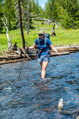 Sticker - Woman Crosses Creek Below Grizzly Lake in Yellowstone