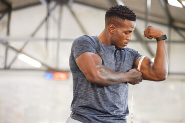 Poster - Black man, tape measure and bicep with muscle and strong athlete, weightlifting and fitness in gym. Power, challenge and arm measurement, male person with exercise and bodybuilding with mockup space