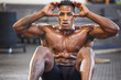 Black man in gym, sweating from sit ups for fitness and abs, exercise routine with muscle and focus. Health, active and determined with core workout, strong male person with sports and training