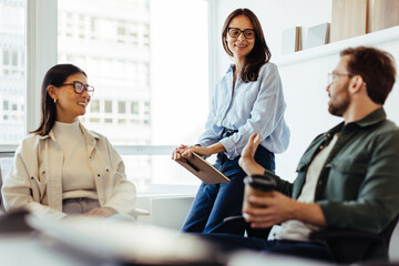 Poster - Team of professionals having a discussion in an office