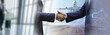 Double exposure businessman wearing suit handshake show best cooperation in business and airplane cargo commercial with growth investment graph, business partnership concept.