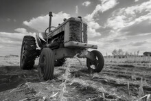 Old Tractor Of The 30s, Working In The Field, Black And White, Sky With Clouds In The Background. Wallpaper. Generative AI