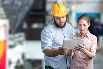 Two industry Employees Discussing Job at the Factory