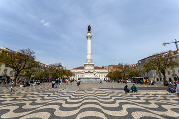 Poster - The King Pedro IV Square in Lisbon on a summer day in Lisbon