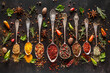 Various spices a vintage spoons on stone table. Colorful Herbal and Spices Oriental marketplace.Top view . Cafe concept. Delicious food delivery.