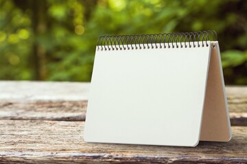 Poster - 2023 blank table calendar on wooden desk