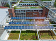 © xiaoliangge - Solar panels on the school roof.