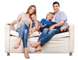 © BillionPhotos.com - Happy family sitting on the sofa smiling at camera