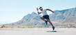 © Julia W/peopleimages.com - Man, fitness and mountain running on road for cardio workout, training or exercise banner in nature. Fit, active or sport male person, athlete or runner exercising on asphalt street with mockup space