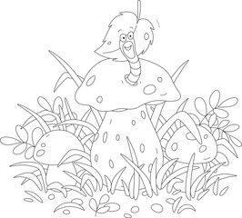 Wall Mural - Friendly smiling small worm looking out of its hole in a large cap of a mushroom among thick grass on a forest glade, black and white outline vector cartoon illustration for a coloring book