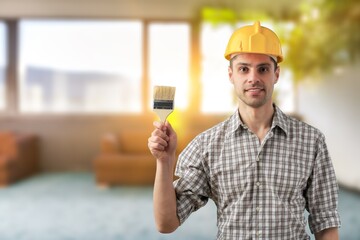 Wall Mural - Portrait of a young person repairing in apartment,