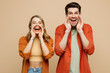 © ViDi Studio - Young couple two friends family man woman wear casual clothes scream sharing hot news about sales discount with hands near mouth together isolated on pastel plain light beige color background studio.