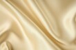 Luxurious of smooth gold silk or satin fabric texture background
