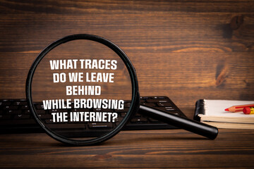 Wall Mural - Traces in the Internet Concept. Computer keyboard on a wooden office table