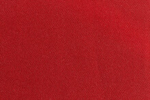 Red Color Fabric Cloth Polyester Texture And Textile Background.