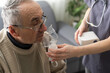 © Angelov - Asthma COPD Breath Nebulizer And Mask Given By Doctor Or Nurse.