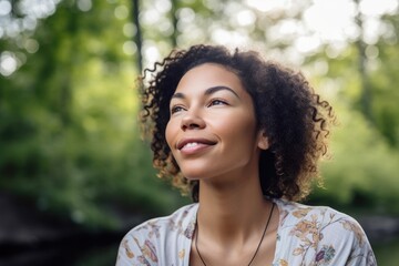 Canvas Print - portrait of a happy mixed race woman doing yoga outdoors, created with generative ai