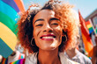 © ADDICTIVE STOCK - Generative AI illustration of delighted young Hispanic woman with curly hair and earrings smiling and looking at camera against LGBT flags
