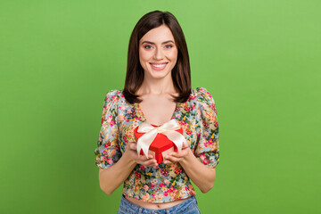 Wall Mural - Portrait of lovely cute person toothy smile arms hold heart figure giftbox isolated on green color background