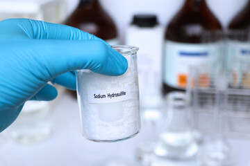 Wall Mural - Sodium hydrosulfite in container, chemical analysis in laboratory