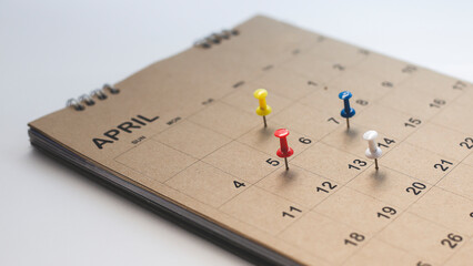 Pin in calendar concept for busy, appointment and meeting reminder, planning for business meeting or travel planning concept.