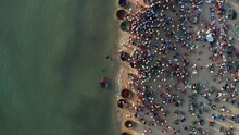 Fish Market During Sunrise On A Beach In Vietnam - Aerial 4k Top-down Shot.