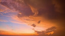 .Watching The Sky In Time Lapse Reveals The Ever Changing Movement Of The Clouds, .the Gradual Changes In Light As The Time Passes..The Orange Clouds Moved And Changed Their Color To Red.