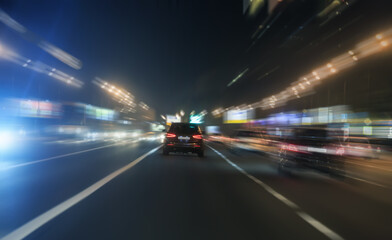 Wall Mural - night traffic on the road in the city center