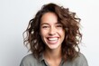 © Robert MEYNER - Portrait of a beautiful young woman laughing and looking at camera.