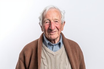 Wall Mural - Portrait of senior man with woolen sweater on white background.