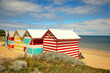 Colourful beach boxes at Brighton beach by a nice and warm summer day in Victoria in Australia