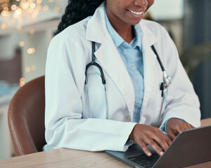 Canvas Print - Laptop, doctor and hands of woman typing for research, healthcare or telehealth in hospital. Computer, medical professional and happy person with online consultation, reading email and wellness