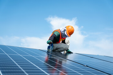 solar power engineer installing solar panels, on the roof, electrical technician at work, alternativ