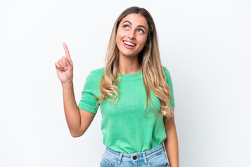 Wall Mural - Young Uruguayan woman isolated on white background pointing up and surprised