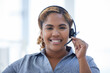 © Wesley J/peopleimages.com - Face, smile and headset on call center woman as telemarketing, crm or sales agent. African person or support consultant portrait with microphone for customer service, contact us or help desk startup
