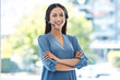 © Divan M/peopleimages.com - Woman with arms crossed, portrait and callcenter, contact us with customer service agent in workplace with smile. CRM, communication and tech support, female consultant for help desk and mockup space