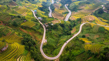 Aerial Top View Rice Terraces And Curvy Road   At  Mu Cang Chai  Northwest Vietnam ,yenbai Vietnam.
