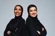 Beautiful arab middle-eastern women with traditional abaya in studio